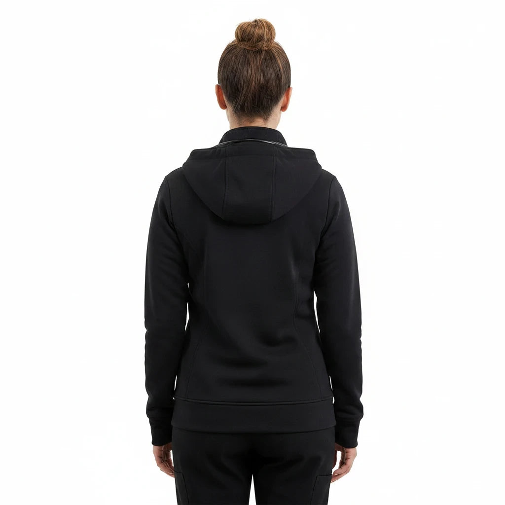 Back view of a woman wearing an Ashtown Clothing black polyester medical zip-up hoodie over matching scrub pants.