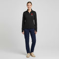 Ashtown Clothing women's black performance full-zip medical jacket with custom embroidery, worn with navy scrub pants.