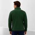 Ashtown Clothing men's dark green fleece medical jacket with a stand-up collar, back view on a model
