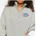 Ashtown Clothing grey fleece quarter-zip pullover with custom embroidered stethoscope and baby feet medical design