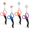 Ashtown Clothing medical trauma shears in pink, blue, orange, and purple with matching retractable badge reels.