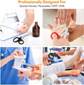 Ashtown Clothing stainless steel medical trauma shears with ergonomic handles and retractable badge reel in use