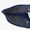 Ashtown Clothing navy blue medical scrub hat featuring an interior grey sweat-wicking terry cloth headband lining.