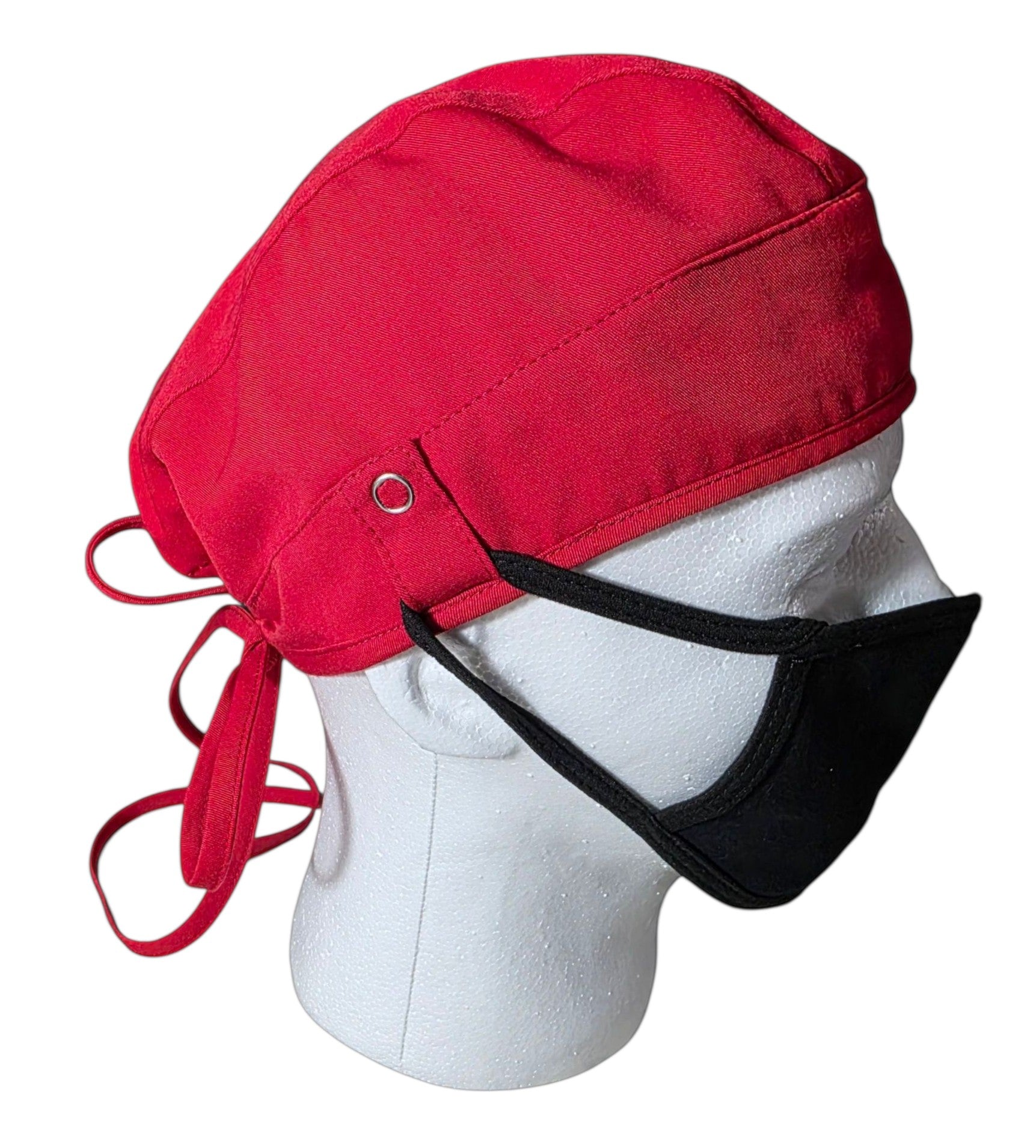 Ashtown Clothing red medical scrub hat with adjustable tie-back closure on a mannequin wearing a black face mask