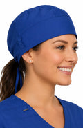 Ashtown Clothing royal blue medical scrub hat with adjustable tie-back closure worn by a healthcare professional